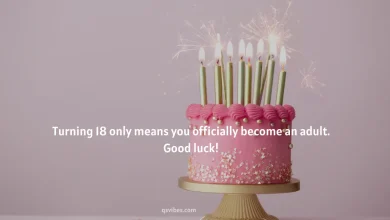 A pink cake with lit candles and celebrate 18th Birthday