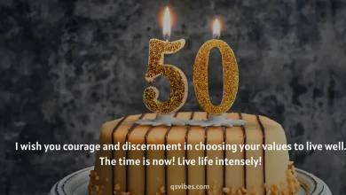 50th birthday celebration cake with lit candles